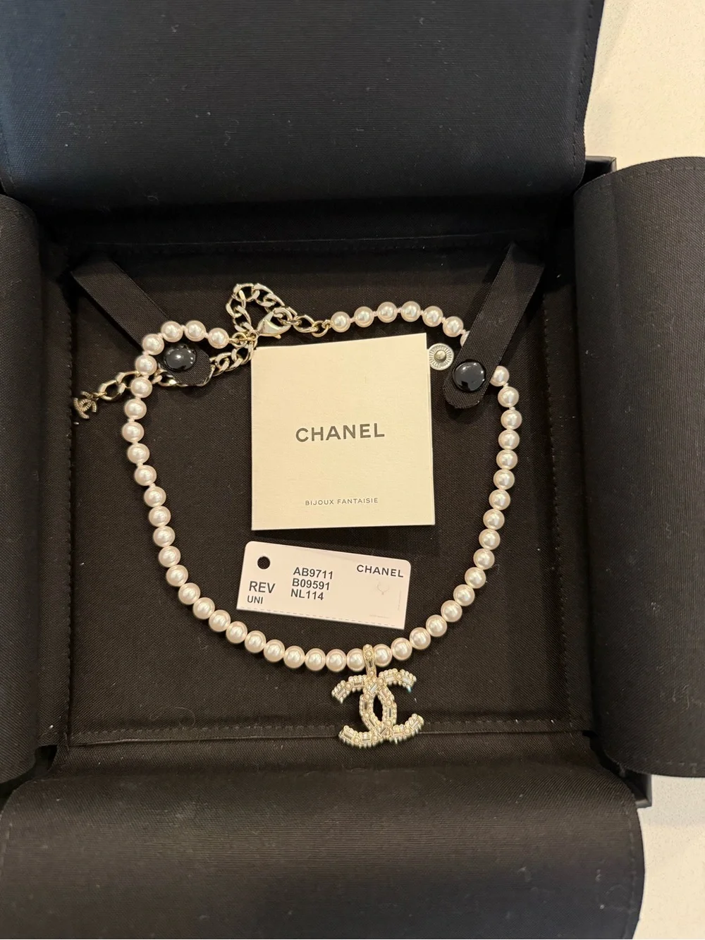 CHANEL Pearl Necklace with Crystal-Studded CC Pendant - White & silver